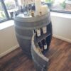 Custom whiskey barrel mini bar at ablaze design group showroom
